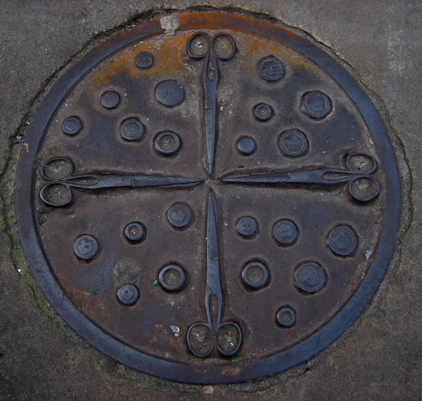 scissor roundels in spitalfields by sculptor keith bowler